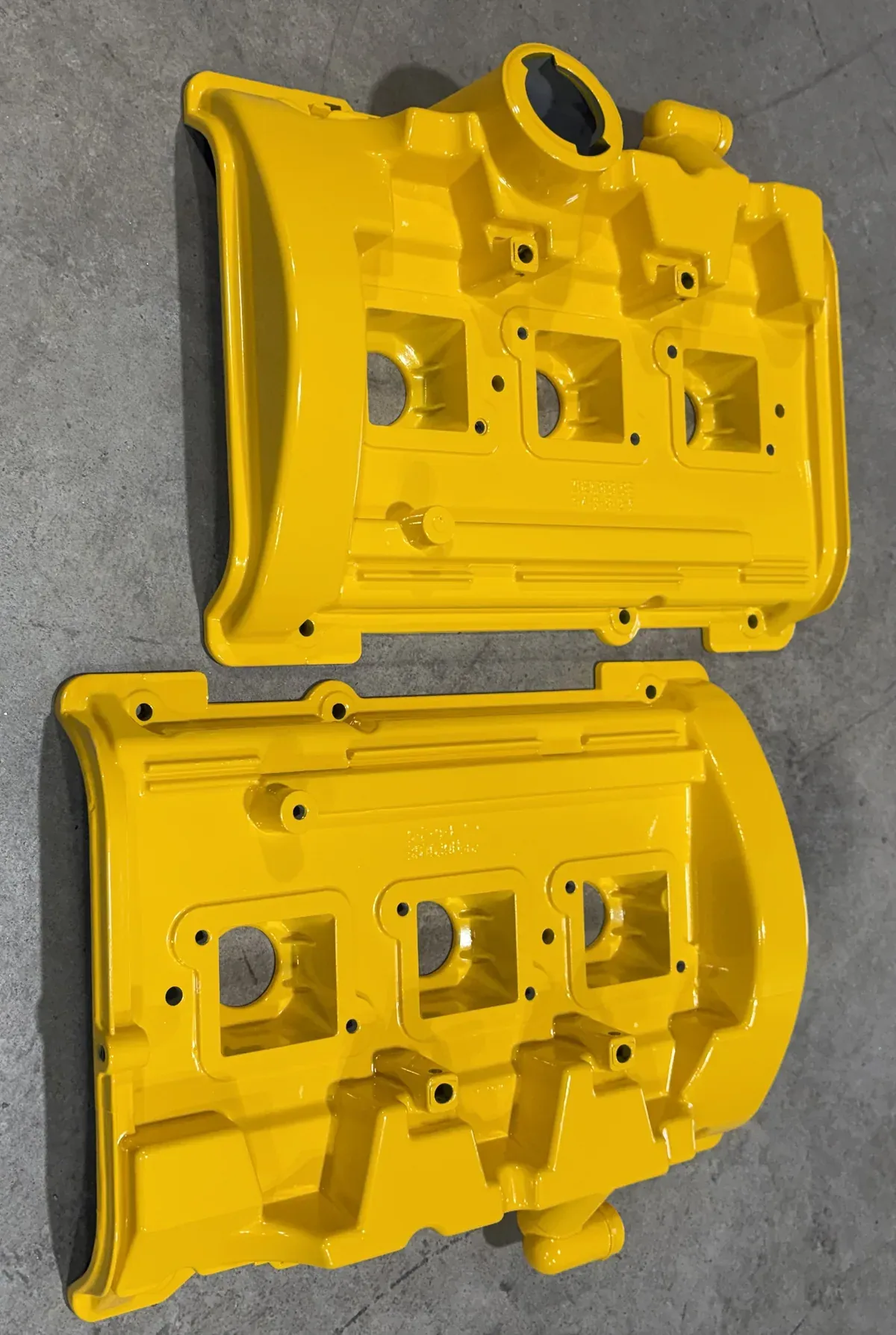 Pair of cam covers powder coated in gloss yellow